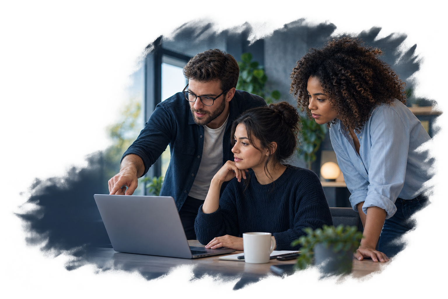 Three digital specialists collaborating around a laptop